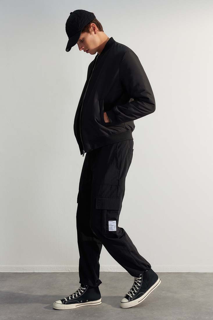 Trendyol Black Men's Jogger Fit Tag Detail Technical Fabric Parachute Limited Edition Trousers.